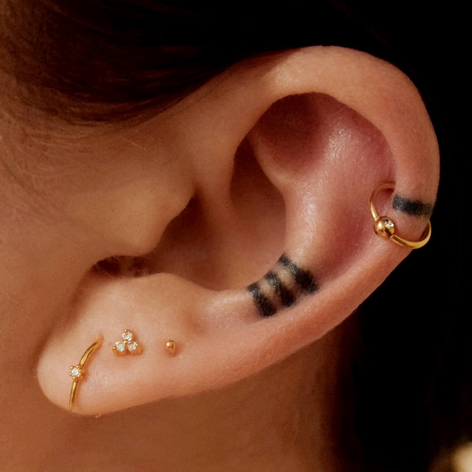 orbital-crystal-cartilage-hoop-shooting-star-open-hoops-mini-crystal-trinity-tiny-secret-studs-1512_9d0d2de5-7c24-4ca0-9d6a-6e94c0855ab0.jpg